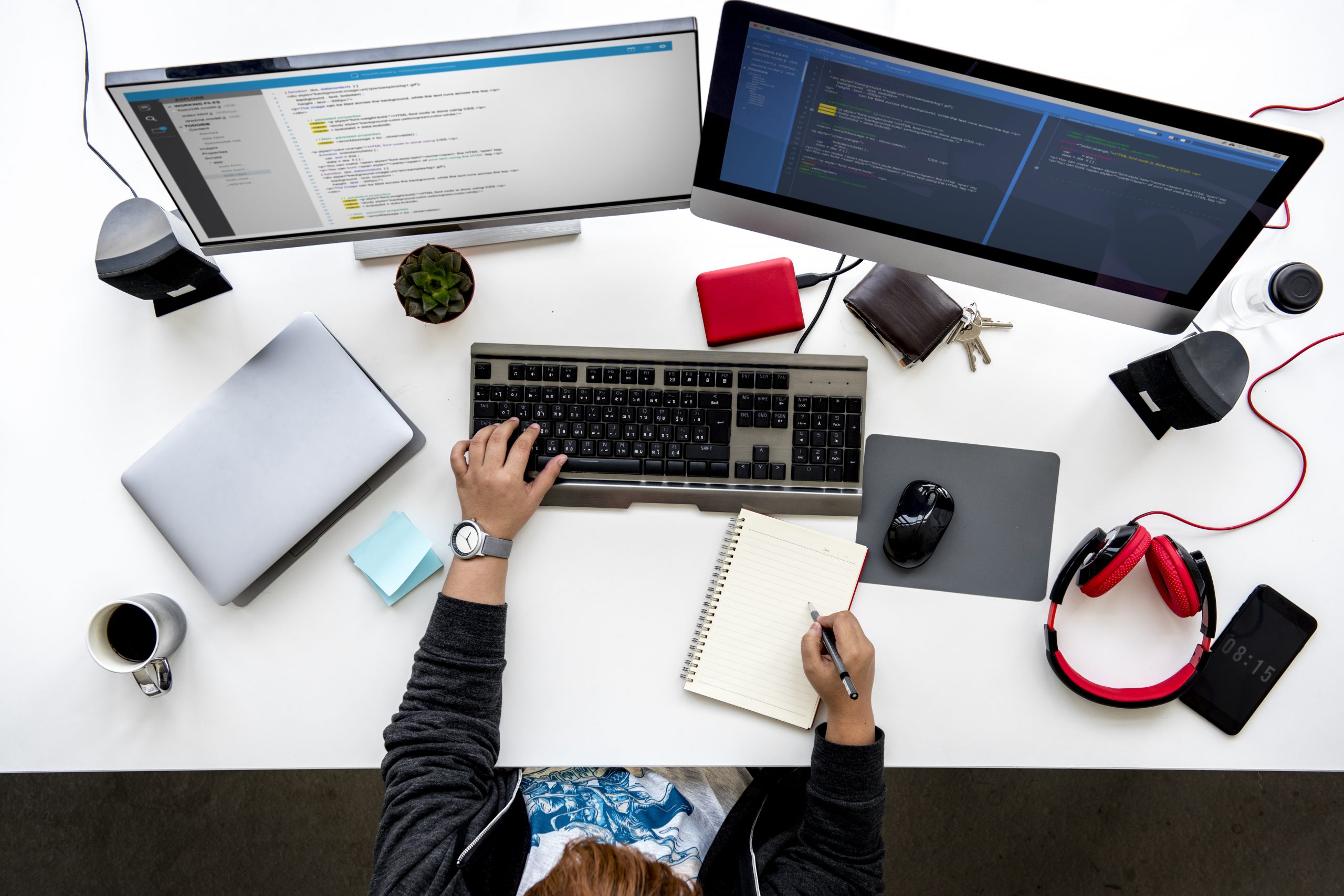People Working on Computer PC on White Table