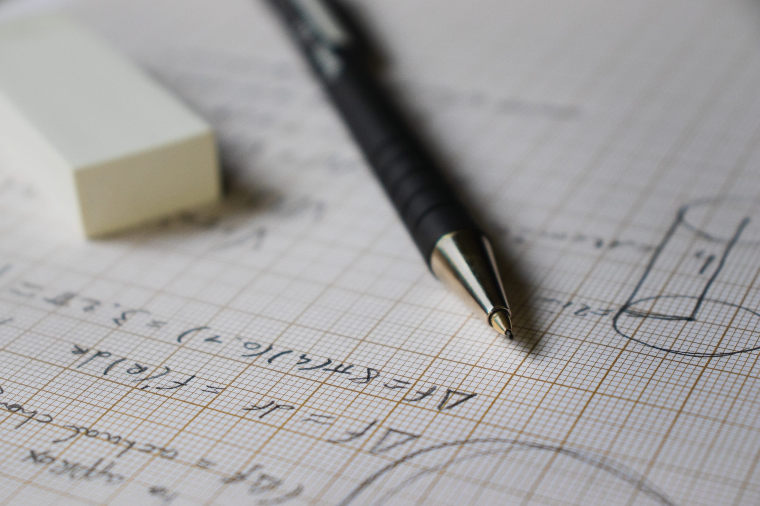 solving-math-problems-in-pencil-on-mm-paper-QU94TNX